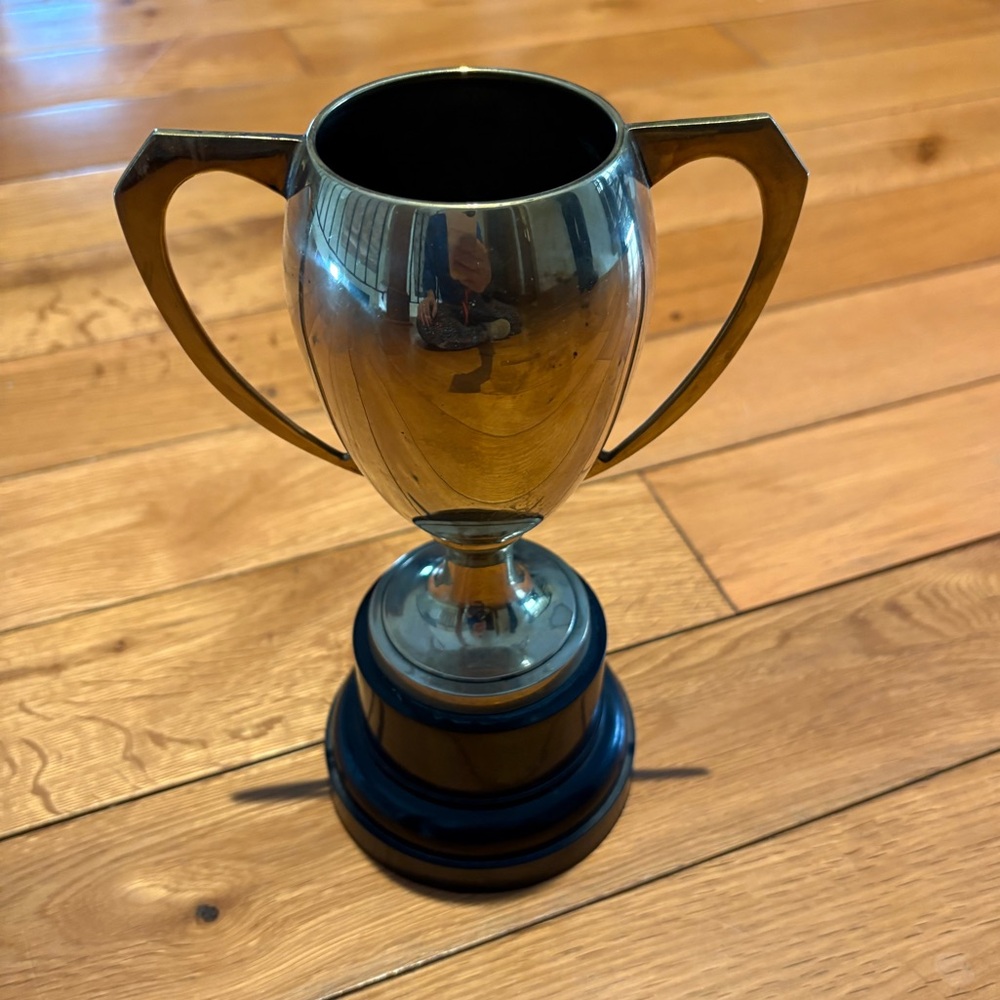 Vintage brass trophy not engraved on black Bakelite base